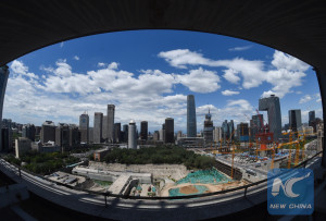 (150612) -- BEIJING, June 12, 2015 (Xinhua) -- Photo taken on June 12, 2015 shows the blue sky above the CBD buildings in Beijing, capital of China. Many regions in China greets fine weather in recent days.   (Xinhua/Luo Xiaoguang) (zwx)